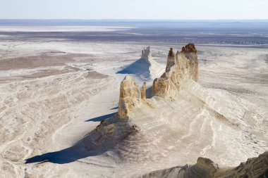 Bozzhira valley pinnacles aerial view, Mangystau region, Kazakhstan. Ak Orpa pinnacles. Beautiful central asia landmark clipart