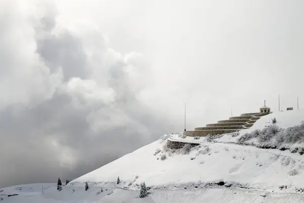 stock image Mountain winter landscape. Mount Grappa war memorial building view. Italian landmark