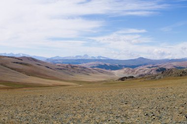 Landscape with dirt road, Altai Tavan Bogd National Park, Mongolia. clipart