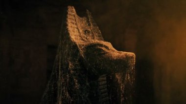 Egyptian Statue In Tomb At Sunset In Cobwebs And Dust