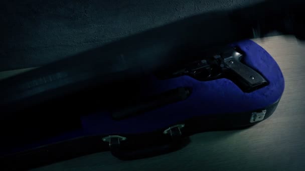 Hitman Opens Instrument Cases Gun Leaves — Vídeo de Stock