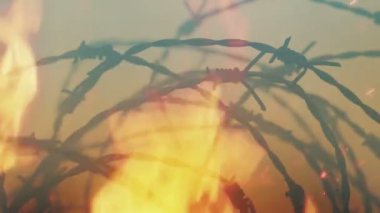 War Zone Detail Barbed Wire And Fire Burning