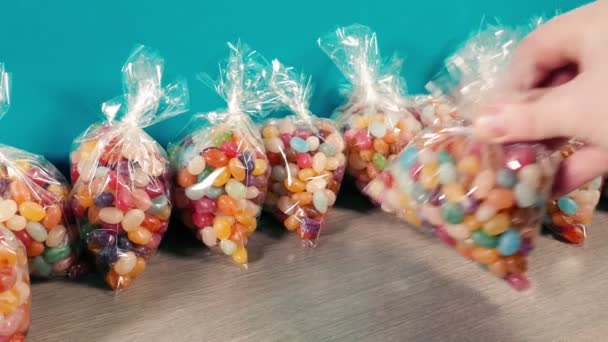Packs Candy Beans Put Out Moving Shot — Vídeo de Stock