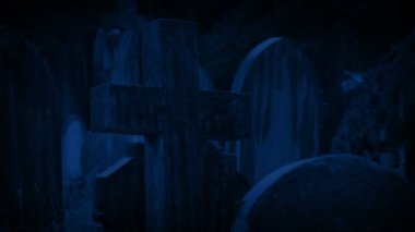 Cross Gravestone On Rainy Night