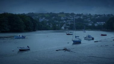 Estuary With Moored Boats In The Evening