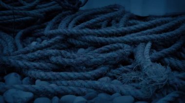 Weathered Fishing Boat Ropes In The Dark
