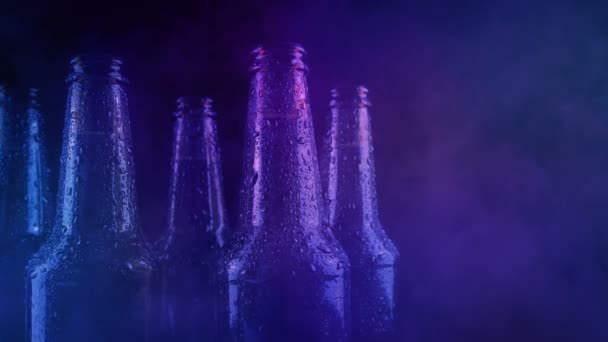 Chilled Beer Bottles Dripping Nightclub — Stockvideo