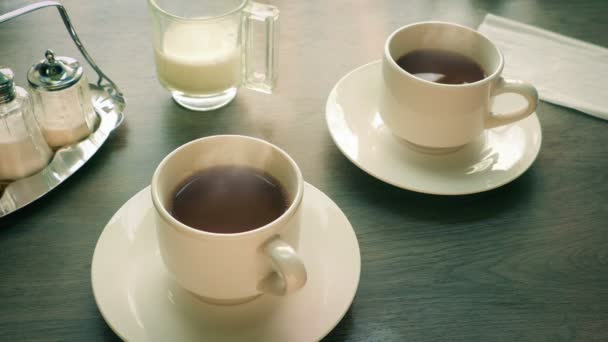 Loop Coffee Cups Table Steaming — Stock video