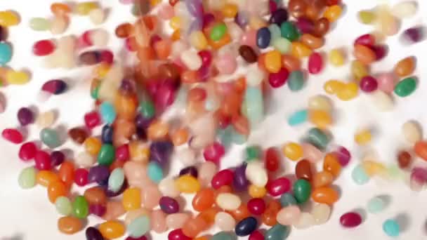 Candy Beans Poured White Fill Screen — Stock video