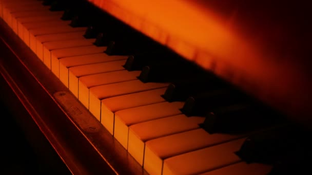 Piano Opens Firelight Closeup — Stock videók