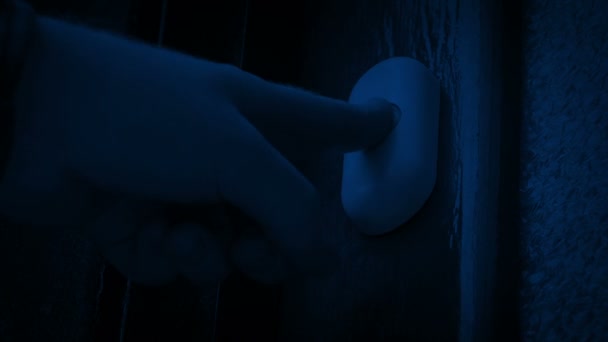 Man Rings Doorbell Night — Stock video