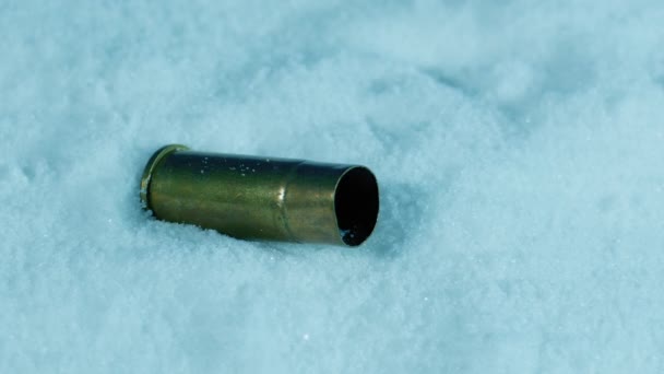 Bullet Cartridge Ejected Snow Day Evening — Stock Video