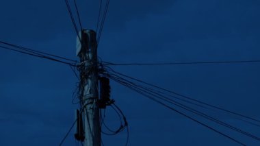 Utility Pole In The Evening