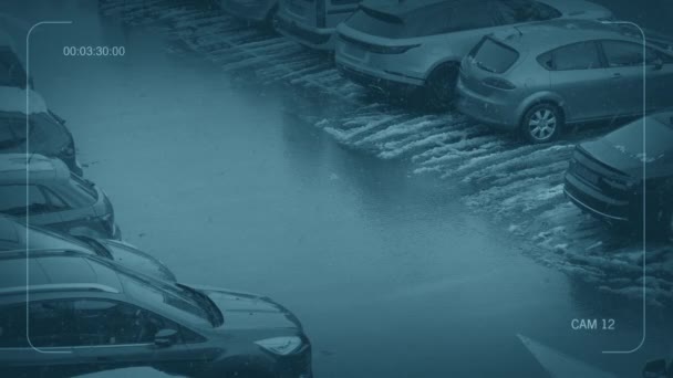Cctv Auto Fährt Bei Schneefall Auf Parkplatz — Stockvideo