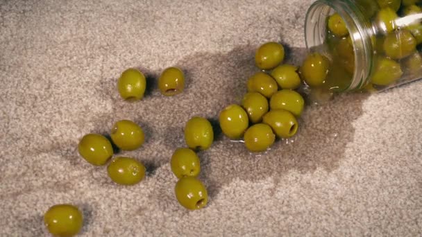 Jar Drops Spilling Olives Carpet — Stock Video