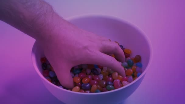 Grabbing Big Handful Candy Beans Party Versions — Stock Video