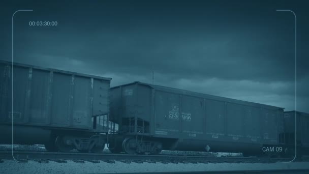 Cctv Freight Train Carriages Passing Storm Clouds Overhead — Stock Video
