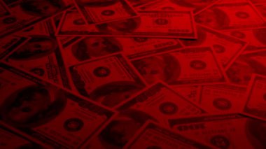Kırmızı ışıkta çok sayıda 100 Dolarlık banknot