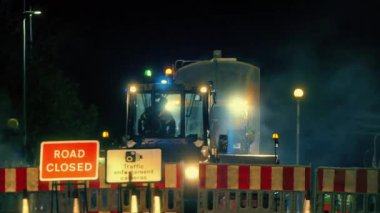 Amublance And Road Works At Night City Scene