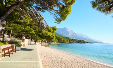 Beach by the Adriatic Sea in Brela town, Croatia clipart