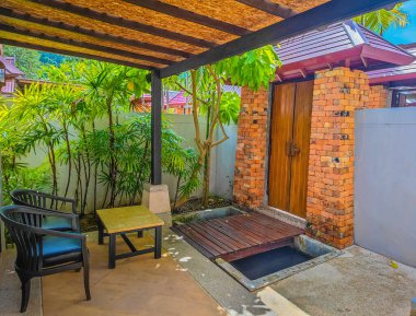 Backyard of a tropical beach house in Thailand in a jungle with private yard