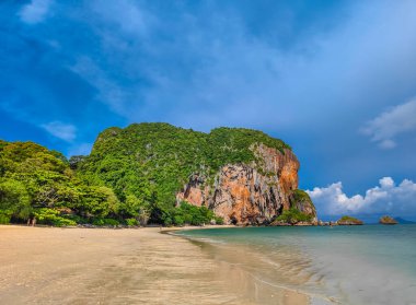 Sandy beach, blue sky, clear water at Phra Nang cave beach, Railay, Krabi province, Thailand