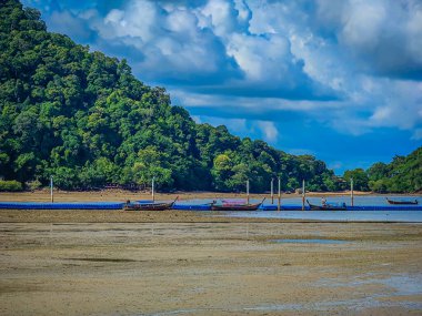 A panoramic view of Railay East beach during low tide in Krabi province, Thailand