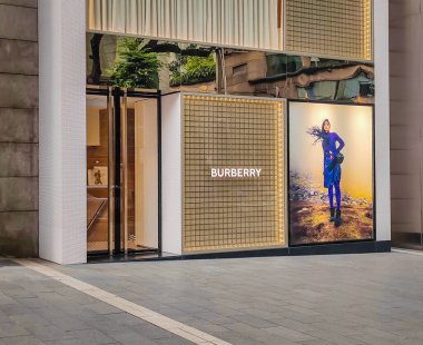 Kuala Lumpur, Malaysia - January 26, 2024: Exterior view of a Burberry store and company logo in the huge luxury shopping mall in Kuala Lumpur clipart