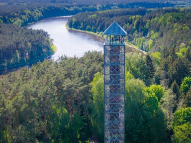 Aerial drone photo of tallest Lithuanian observation view tower in Birstonas resort in autumn on the shore of Nemunas river clipart