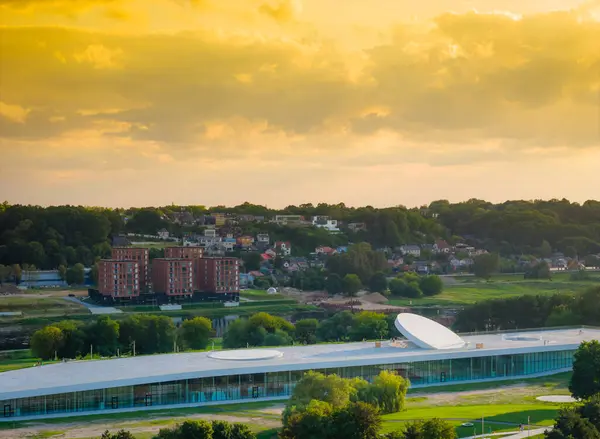 stock image Science an innovation museum in Nemunas island in Kaunas city center during a sunset. Aerial drone view photo of museum which is called Science island