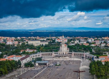 Panoramic aerial drone view of Fatima city, Portugal. One of the most important pilgrims international destination for religious tourists in the world clipart