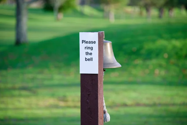 Ring the bell please sign on golf course UK
