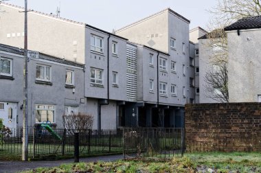 High rise council flats in poor housing estate with many social welfare issues in Maryhill, Glasgow UK