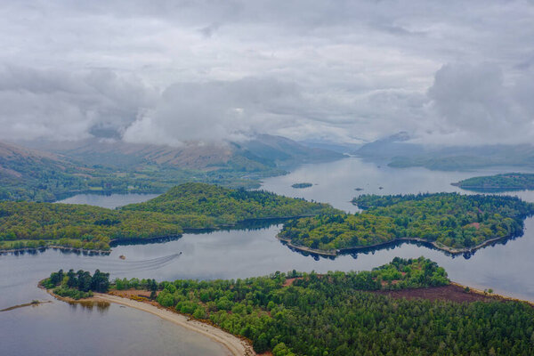 Loch Lomond aerial view showing islands Inchtavannach, Inchconnachan, Inchcruin and Inchfad UK