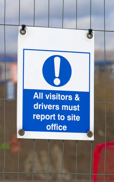 Construction site visitors and drivers report to site office UK