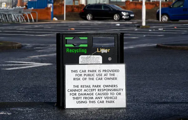 Car park users do so at own risk sign UK
