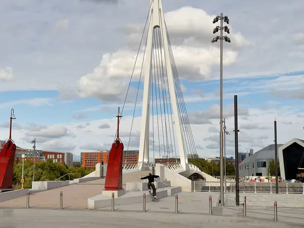 stock image Glasgow, UK, September 13th 2024, Govan to Partick pedestrian bridge and skateboarder