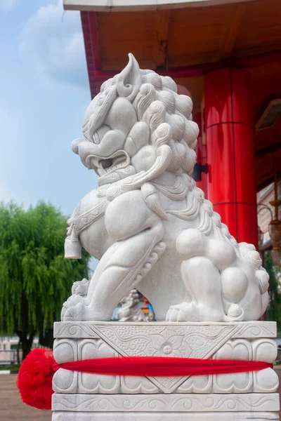 white jade Chinese guardian lion in Thai-Chinese Cultural Center, Udon thani,  Thailand. Portrait size