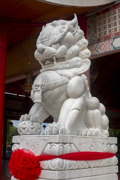 white jade Chinese guardian lion in Thai-Chinese Cultural Center, Udon thani,  Thailand. Portrait size