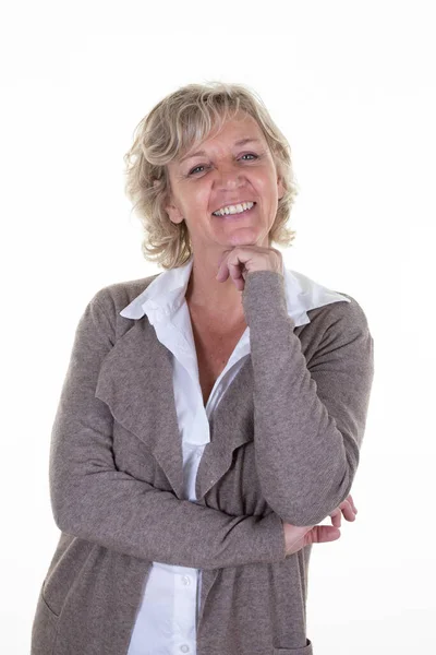 stock image pensive beautiful senior woman smiling mature looking happy face cute smile posing in white copy space wall background