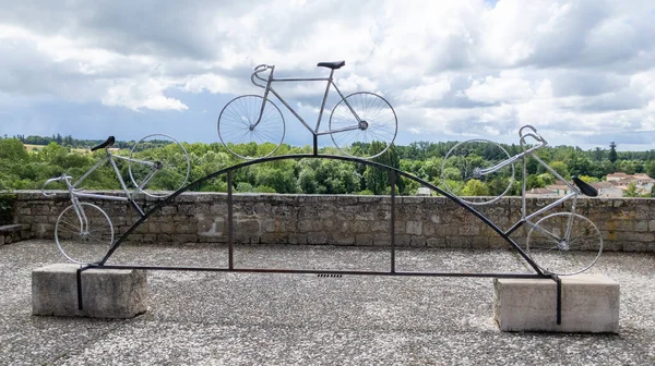 art sculpture of bicycles street in city Pons in charente maritime France