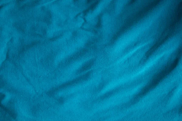 天鹅绒织物 深褐色织物 天然棉或亚麻织物 无缝背景用 蓝色织物褶皱纹理 — 图库照片