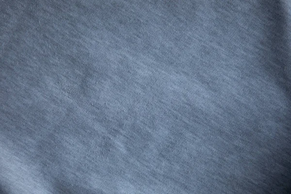 グレーの綿のテクスチャキャンバスグレーの生地の背景の繊維とセーター表面の折り目の詳細 — ストック写真