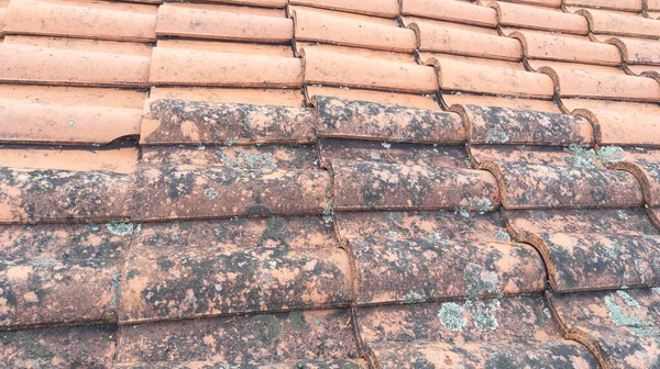 Roof cleaning tiles with high pressure cleaner and before after