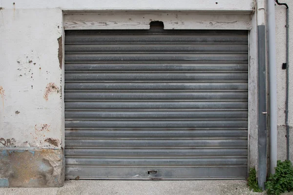 Steel Sequential Old Worn Metal Garage Door — Stock Photo, Image