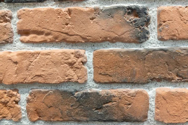 facade Brick wall background of bricks building horizontal stones wallpaper