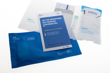 Bordeaux , Aquitaine  France - 01 18 2023 : Screening colorectal Self-Contained Colorectal Cancer Screening Test Kit medic testing sample with paper flyer