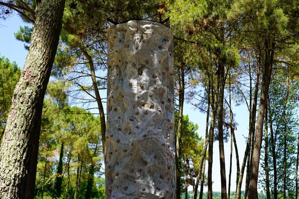 artificial climbing wall in city forest outdoors rock climb wall background