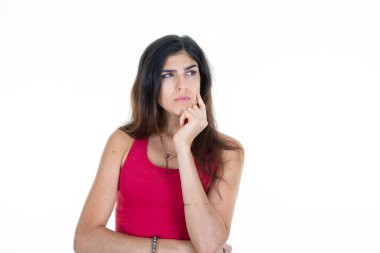 pensive woman look side hand finger on chin aside copy space isolated on white background clipart