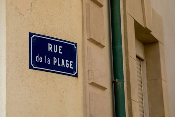 rue de la plage means beach street in french urban city name plaque town